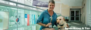 Brenda and Tibet, stars of The Courthouse Dog with their Telly Award